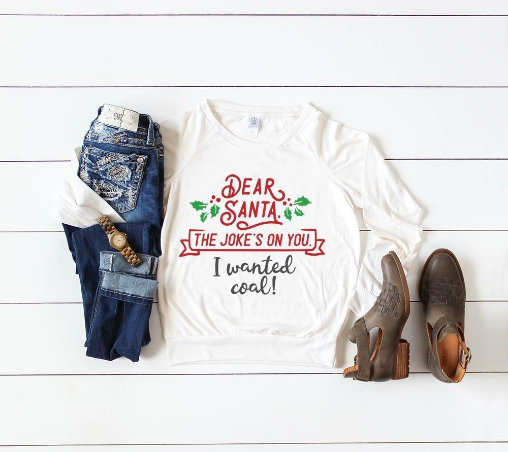 a Christmas tee that reads "Dear Santa , The Joke's on You, I Wanted Coal!" with mistletoe on both sides of the phrase